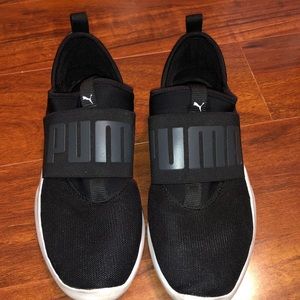 Black women’s puma shoes.